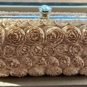NWT Bebe Cream Clutch with Rosettes